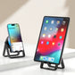 📱🎵4-in-1 Multifunctionele Smartphonehouder met Bluetooth-luidspreker